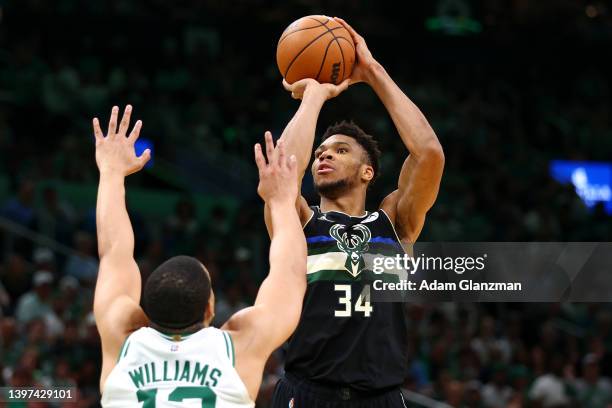 Giannis Antetokounmpo of the Milwaukee Bucks shoots the ball against Grant Williams of the Boston Celtics during the third quarter in Game Seven of...