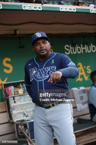 Third Base Coach Rodney Linares of the Tampa Bay Rays in the dugout before the game against the Oakland Athletics at RingCentral Coliseum on May 2,...