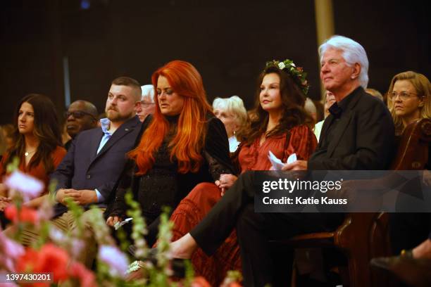 Wynonna Judd, Ashley Judd, and Larry Strickland attend CMT and Sandbox Live's "Naomi Judd: A River Of Time Celebration" at Ryman Auditorium on May...