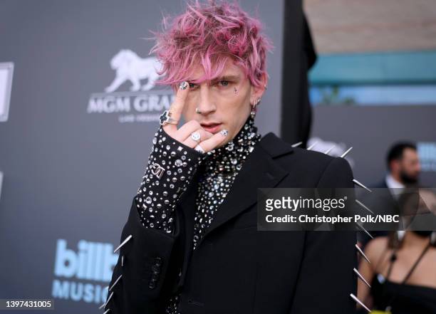 May 15: 2022 BILLBOARD MUSIC AWARDS -- Pictured: Machine Gun Kelly arrives to the 2022 Billboard Music Awards held at the MGM Grand Garden Arena on...