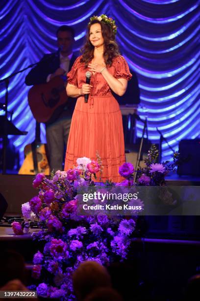 Ashley Judd speaks onstage during CMT and Sandbox Live's "Naomi Judd: A River Of Time Celebration" at Ryman Auditorium on May 15, 2022 in Nashville,...