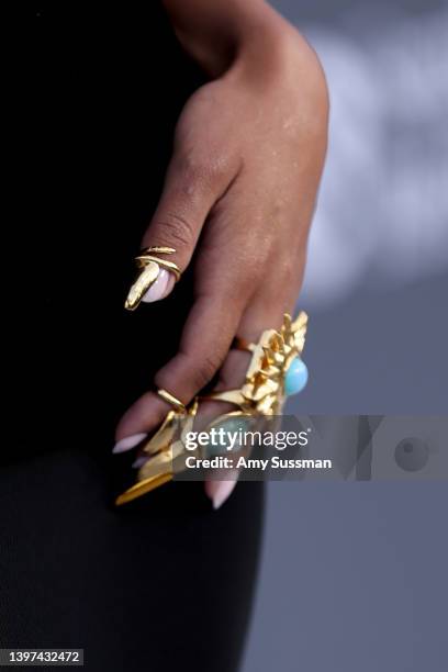 Doja Cat, jewelry detail, attends the 2022 Billboard Music Awards at MGM Grand Garden Arena on May 15, 2022 in Las Vegas, Nevada.