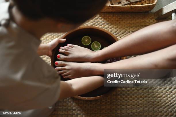 luxury spa foot bath - beauty salons services stock pictures, royalty-free photos & images