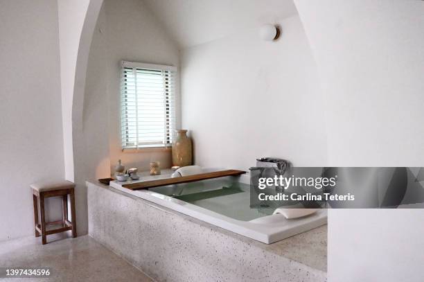 luxurious spa bath tub - hotel bathroom stock pictures, royalty-free photos & images