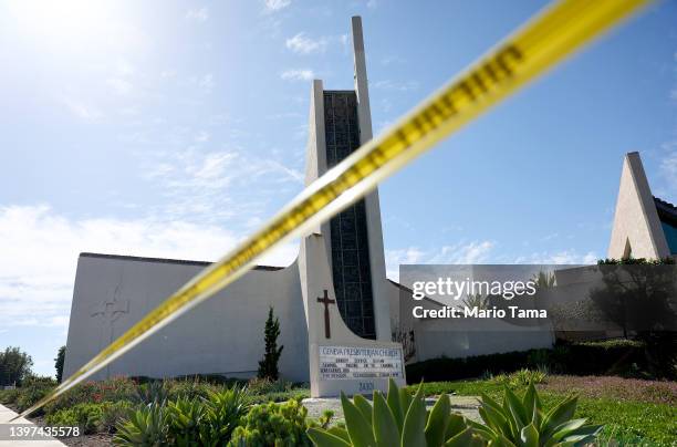 Police tape blocks off the scene of a shooting at the Geneva Presbyterian Church on May 15, 2022 in Laguna Woods, California. According to police,...