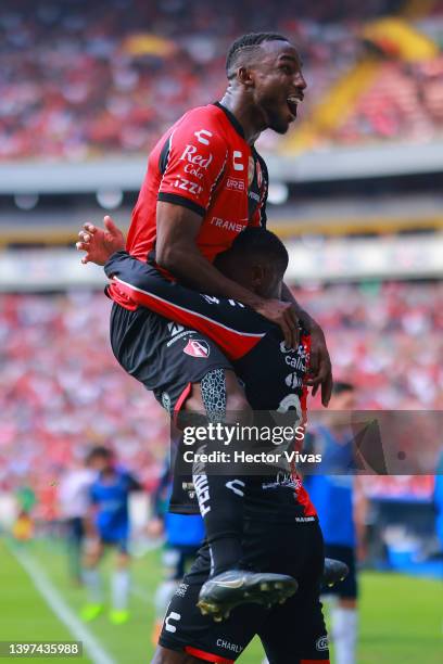 Anibal Chala of Atlas celebrates with teammate Julián Quiñones after scoring his team’s first goal during the quartefinals second leg match between...