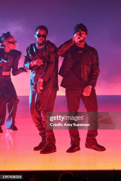 Host Sean ‘Diddy’ Combs and Bryson Tiller perform onstage during the 2022 Billboard Music Awards at MGM Grand Garden Arena on May 15, 2022 in Las...