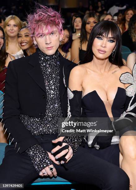 Machine Gun Kelly and Megan Fox attend the 2022 Billboard Music Awards at MGM Grand Garden Arena on May 15, 2022 in Las Vegas, Nevada.