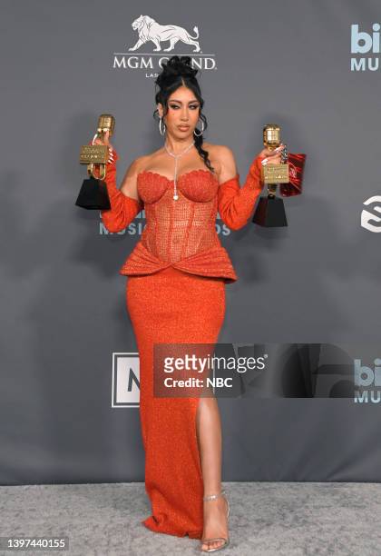 May 15: 2022 BILLBOARD MUSIC AWARDS -- Pictured: Kali Uchis poses backstage from the backstage press room with awards for Top Latin Female Artist and...