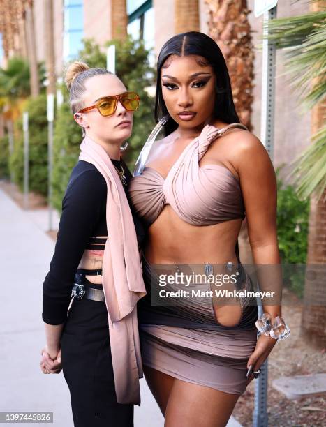 Cara Delevingne and Megan Thee Stallion attend the 2022 Billboard Music Awards at MGM Grand Garden Arena on May 15, 2022 in Las Vegas, Nevada.