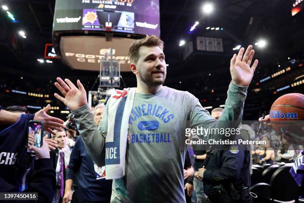 Luka Doncic of the Dallas Mavericks leaves the court after defeating the Phoenix Suns 123-90 in Game Seven of the 2022 NBA Playoffs Western...