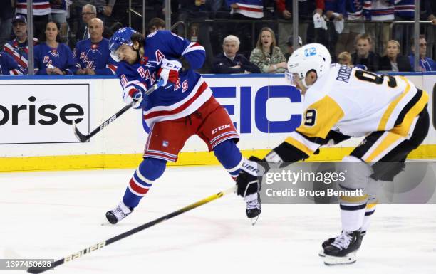 Artemi Panarin of the New York Rangers scores the series-winning overtime goal against the Pittsburgh Penguins in Game Seven of the First Round of...