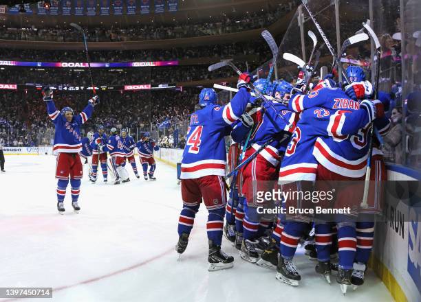 Artemi Panarin of the New York Rangers celebrates his game winning overtime goal against the Pittsburgh Penguins in Game Seven of the First Round of...