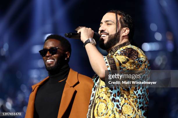 Host Sean 'Diddy' Combs and French Montana speak onstage during the 2022 Billboard Music Awards at MGM Grand Garden Arena on May 15, 2022 in Las...