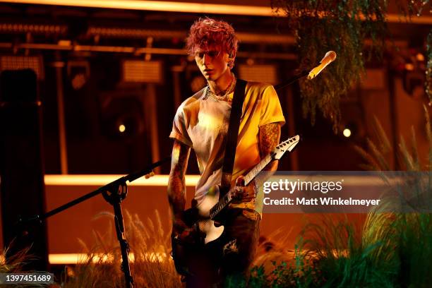 Machine Gun Kelly performs onstage the 2022 Billboard Music Awards at MGM Grand Garden Arena on May 15, 2022 in Las Vegas, Nevada.