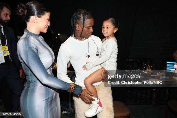 May 15: 2022 BILLBOARD MUSIC AWARDS -- Pictured: Kylie Jenner, Stormi Webster, and Travis Scott backstage during the 2022 Billboard Music Awards held...