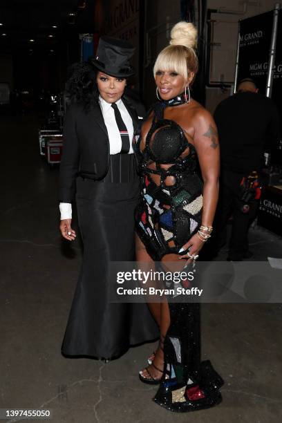 Janet Jackson and Icon Award winner Mary J. Blige pose backstage during the 2022 Billboard Music Awards at MGM Grand Garden Arena on May 15, 2022 in...