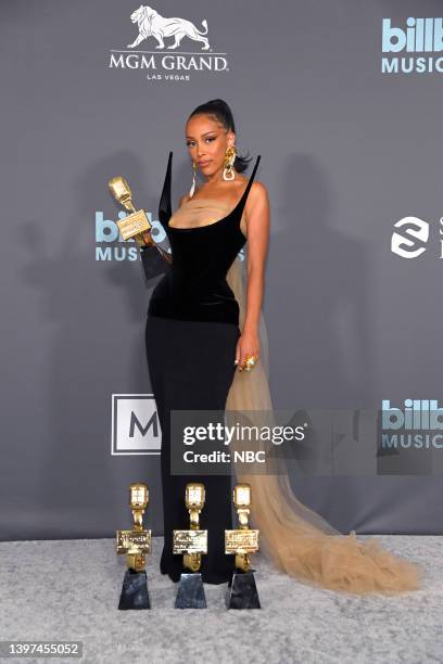 May 15: 2022 BILLBOARD MUSIC AWARDS -- Pictured: Doja Cat poses in the backstage press room during the 2022 Billboard Music Awards held at the MGM...