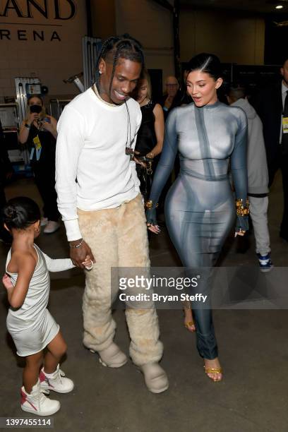 Stormi Webster, Travis Scott, and Kylie Jenner attend the 2022 Billboard Music Awards at MGM Grand Garden Arena on May 15, 2022 in Las Vegas, Nevada.