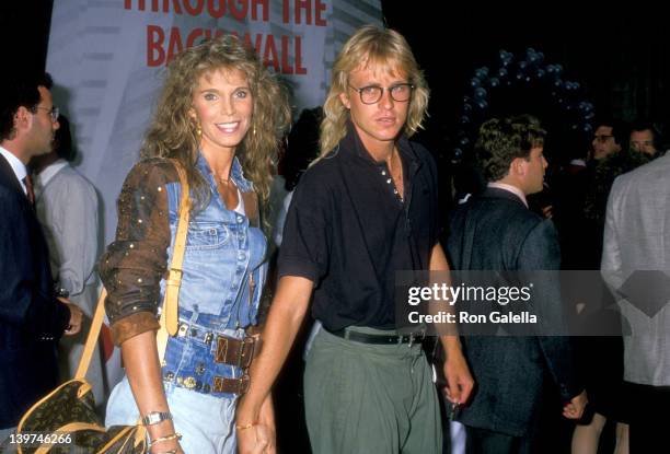 Actress Ann Turkel and date attend the "Die Hard" West Hollywood Premiere on July 12, 1988 at Avco Center Cinemas in Westwood, California.