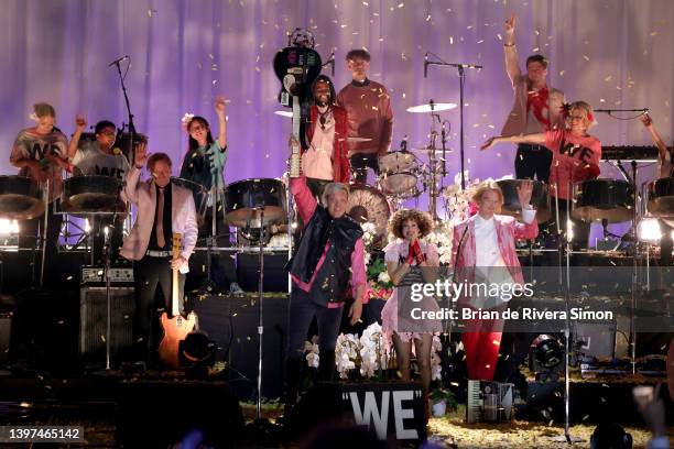 Tim Kingsbury, Win Butler, Jeremy Gara, and Régine Chassagne of Arcade Fire perform onstage during the 2022 JUNO Awards Broadcast at Budweiser Stage...