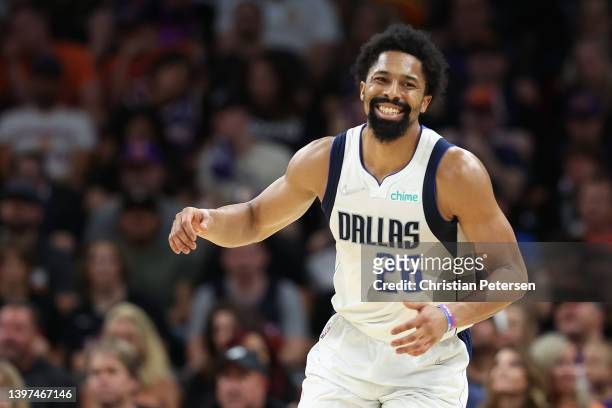 Spencer Dinwiddie of the Dallas Mavericks reacts after a three-point shot against the Phoenix Suns during the first half of Game Seven of the Western...