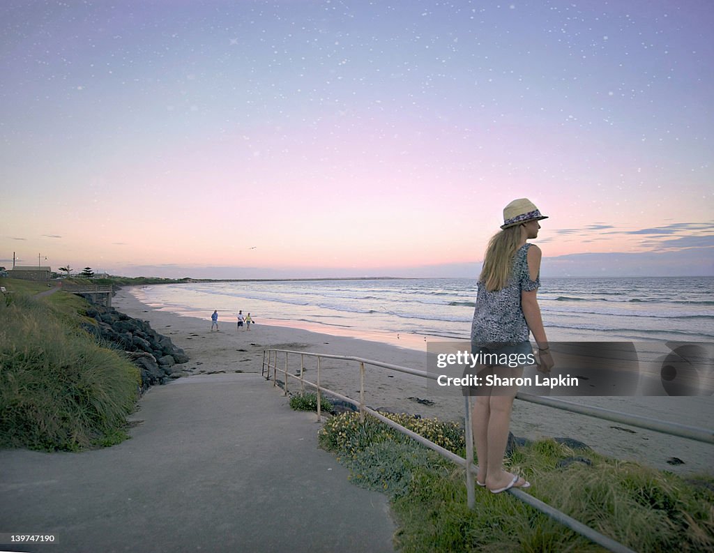 Standing On Railing Girl Standing On Railing High-Res Stock Photo - Getty Images