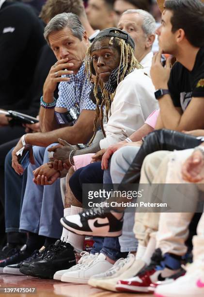 Rapper Lil Wayne attends Game Seven of the Western Conference Second Round NBA Playoffs at Footprint Center on May 15, 2022 in Phoenix, Arizona. NOTE...