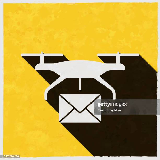 delivery drone with mail. icon with long shadow on textured yellow background - plane shadow stock illustrations