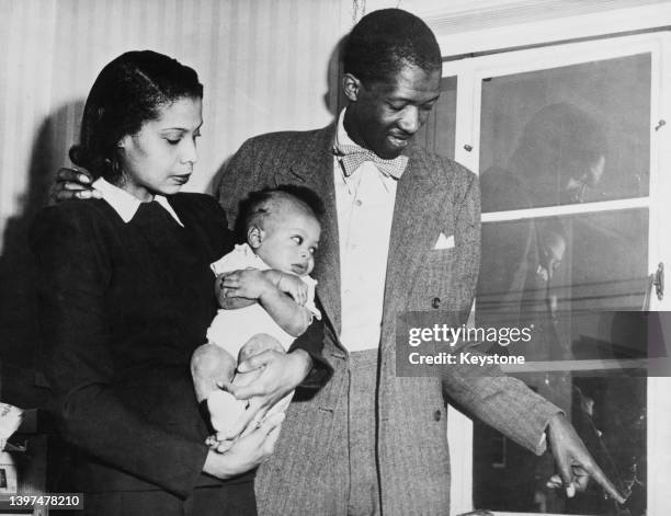 American marketing manager Odis von Blasingame with his wife, Georgetta Childress von Blasingame, and their son, Odis von Blasingame Jr, beside a...