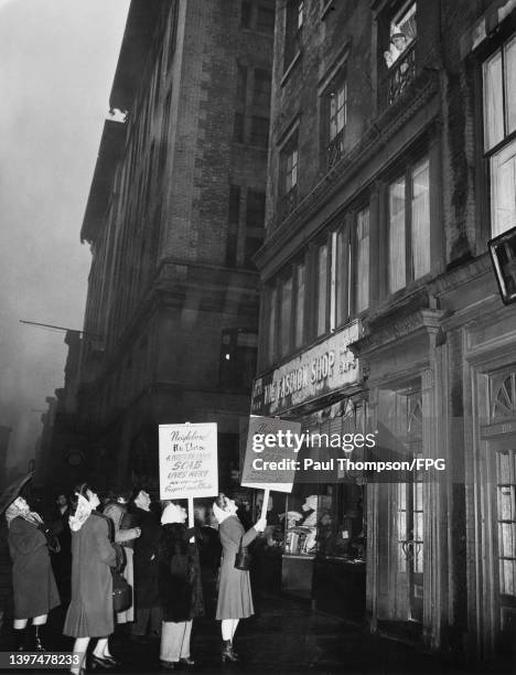 Western Union strikers picket outside the home of strike breaker Rita Eliseo on Bleecker Street in the borough of Manhattan, New York City , New...