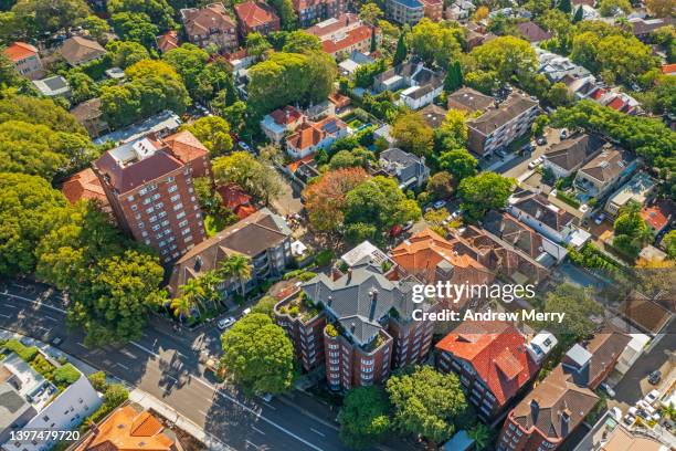 red brick apartment buildings, houses and trees, aerial view - nsw landscape photos et images de collection