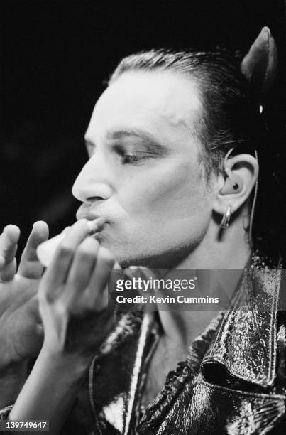 Irish singer Bono, backstage at the Feijenoord Stadion, Rotterdam, being made-up as his stage persona Mr MacPhisto, before a concert by rock group U2...