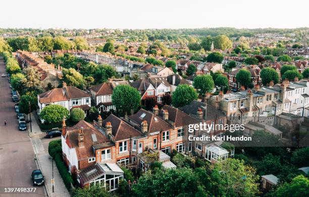 an aerial view of an suburban streets and houses in north london - neighborhood stock pictures, royalty-free photos & images