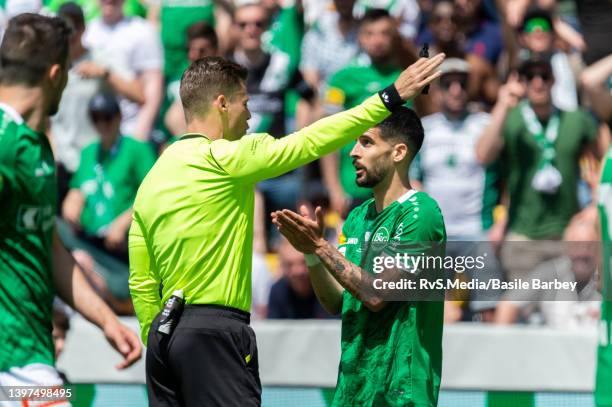 Victor Ruiz Abril of FC St. Gallen 1879 talks with referee Urs Schnyder during the Swiss Cup Final match between FC Lugano v FC St. Gallen 1879 at...