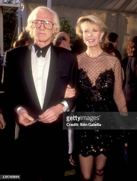 Actor Richard Harris and Cassandra Harris attend the 63rd Annual Academy Awards on March 25, 1991 at Shrine Auditorium in Los Angeles, California.