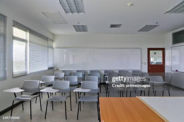 empty classroom with chairs and white board - high school exam stock pictures, royalty-free photos & images