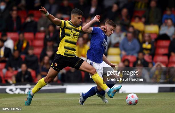 Harvey Barnes of Leicester City is tackled by Adam Masina of Watford FC during the Premier League match between Watford and Leicester City at...