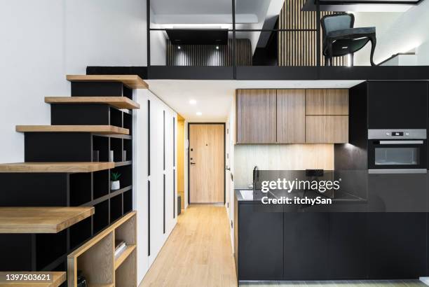 view to small loft apartment - mezzanine stockfoto's en -beelden