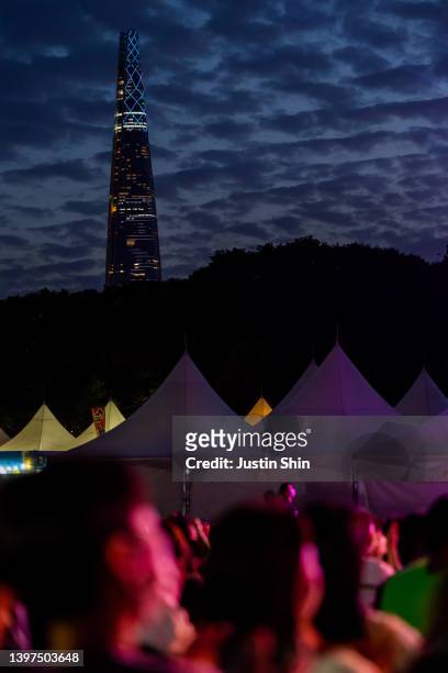 Scenery of Lotte World Tower during Ado's performance at Beautiful Mint Life Music Festival at Olympic Park on May 13, 2022 in Seoul, South Korea.