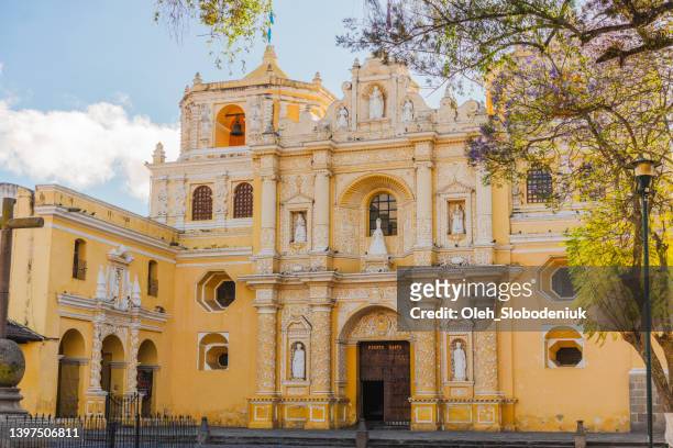 scenic view of church in antigua at sunrise - guatemala city skyline stock pictures, royalty-free photos & images