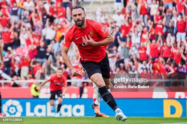 Vedat Muriqi of RCD Mallorca celebrates scoring his team's first goal during the LaLiga Santander match between RCD Mallorca and Rayo Vallecano at...