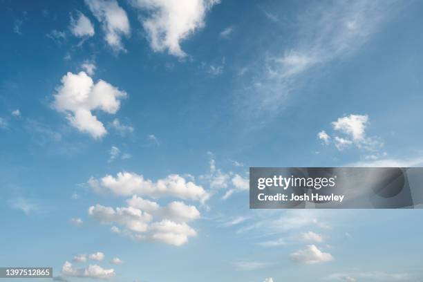 beautiful clouds against blue sky - wispy stock pictures, royalty-free photos & images