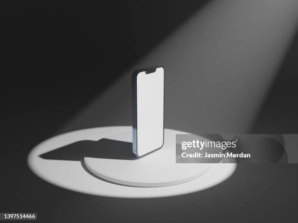 mobile phone on stage under light - stage light 3d stock pictures, royalty-free photos & images