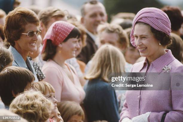 Queen Elizabeth II meets the crowd in Christchurch during her visit to New Zealand, 1977.