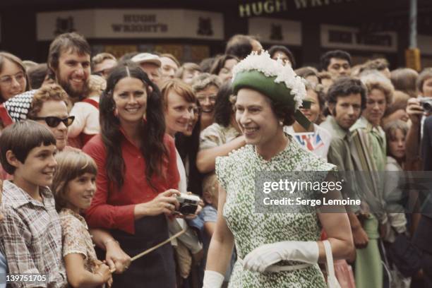 Queen Elizabeth II meets the crowd during her visit to New Zealand, 1977.