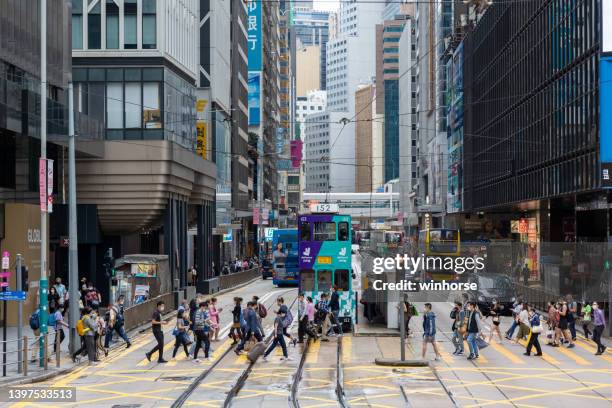 des voeux road central in central, hong kong - hong kong central stock pictures, royalty-free photos & images