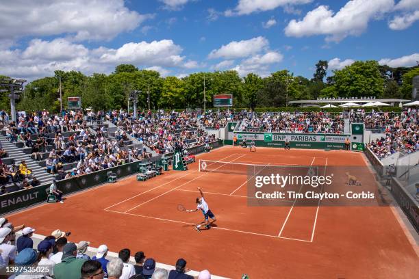 May 16. A general view of Pierre-Hugues Herbert of France serving against Thiago Agustin Tirante of Argentina on a packed court fourteen during the...