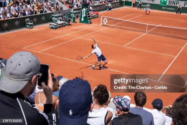 May 16. A general view of Pierre-Hugues Herbert of France serving against Thiago Agustin Tirante of Argentina on a packed court fourteen during the...