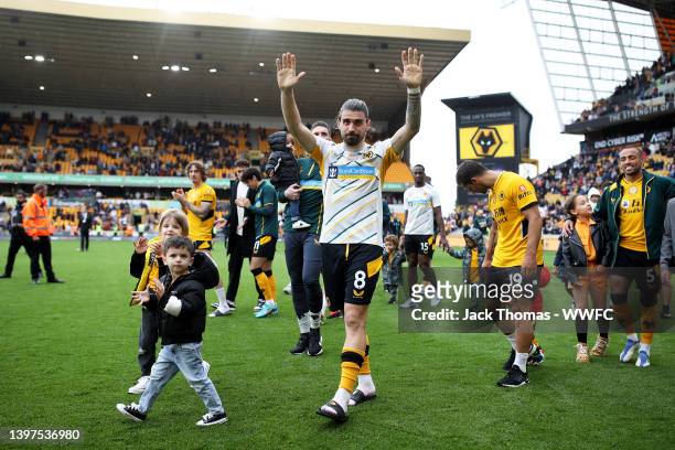 Ruben Neves of Wolverhampton Wanderers walks around the pitch for a lap of honour following the Premier League match between Wolverhampton Wanderers...